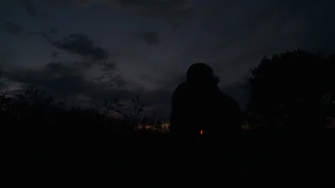 Man Walking with a Bow at Night, Close Up  Stock Footage 92094739
