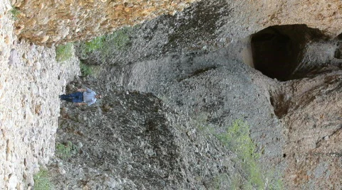 Man walking box canyon vertical P HD 3563 Stock-Footage 534457