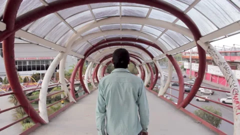 Man walking on the bridge Video stock 232960311