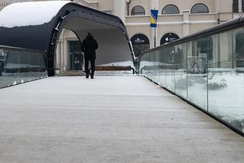 Man Walking on the Bridge Stock Photos