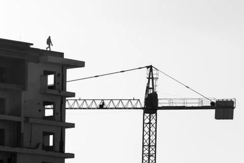 Man walking on building Stock Photos
