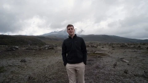 Man walking from camera in wild mountains, Ecuador Video stock 128156890
