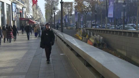 Man Walking On The Champs Elysees In Paris, France Stock Footage 158599854