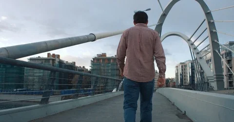 Man Walking On The City Bridge Stock-Footage 76758757