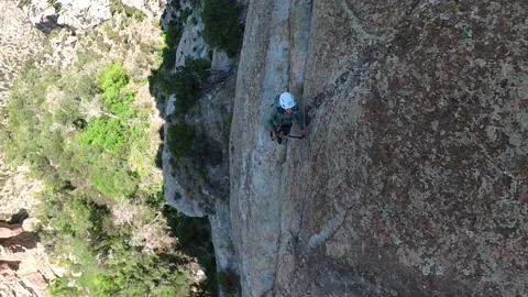 Man Walking on Cliff Rock, Top Down 360 Degrees Camera Point of View Stock Footage 345043670