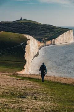Man walking on the cliffs Stock Photos