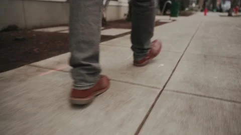 Man walking close up of shoes, to the work in Portland, USA, motivation Stock Footage 238762779