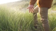 Man Walking On Coast In Slow Motion Stock Footage