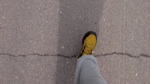 A man walking confidently in a pair of stylish sneakers. Stock Footage 333167089