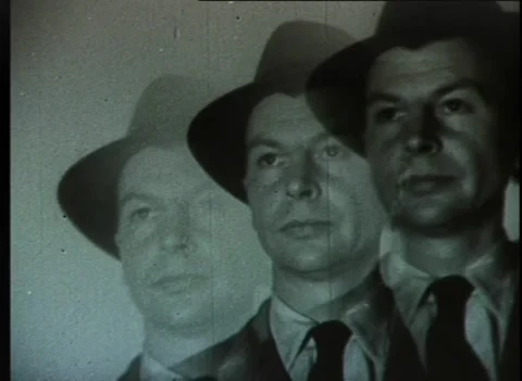 MAN WALKING IN CREEPY GHOSTLY LIKE SCENE / DOUBLE VISION (1940s) Stock Footage 257167922