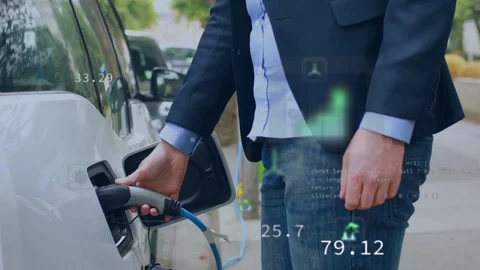Man walking curb EV, opening flap, plugging in, watching energy overlays around Stockbeeldmateriaal 335316616