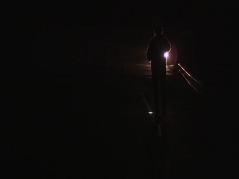 Man Walking On Dark Highway At Night Stock Footage 82265484