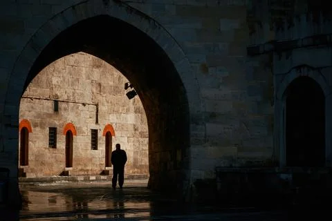 The man walking from the dark path to the light. 25 April 2023. Stock Photos