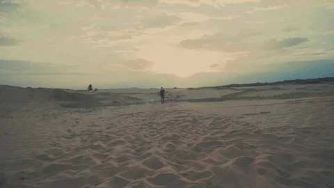 Man is walking in desert Stock-Footage 102028778