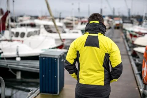 Man walking in dock Stock Photos