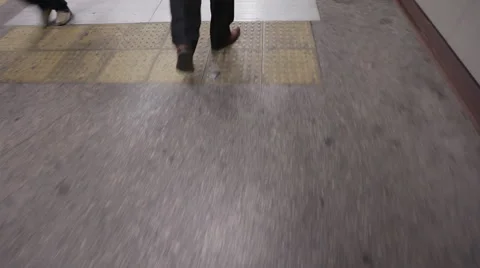 Man walking down the elevator stairs following another man - Istanbul metro Stock Footage 43023069