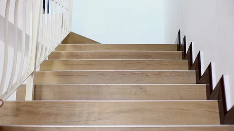 Man walking down to floor below Stock Footage 129174948
