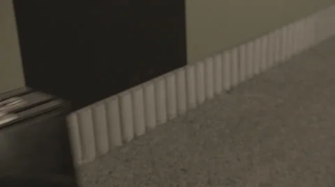 Man Walking Down Hallway With Suit Case Close Up 库存影片 63991488