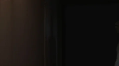 Man walking down hallway with towel angry. Video stock 99609645