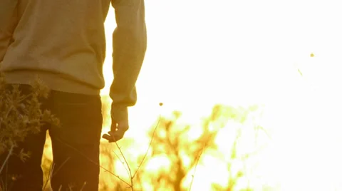 Man Walking Down Hill Video stock 33360888
