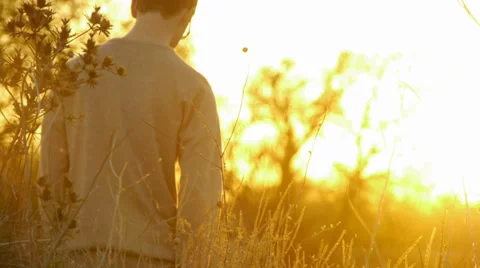 Man Walking Down Hill, Slow Motion Video stock 33362315