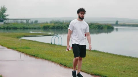 A man walking down the path Stock Footage 161270793