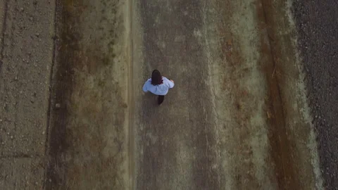 Man walking down rural road in rural Japan 库存影片 246462823