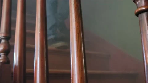 Man walking down stairs Stock Footage 234652608