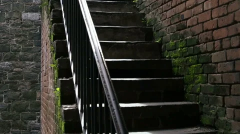 Man Walking Down the Stairs with Phone in Slow Motion Stock Footage 40292345