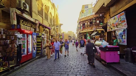 A man walking down a street in a city Stock Footage 292268614