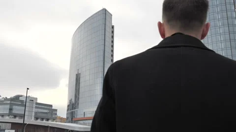 Man walking down the street Stock Footage 103795730