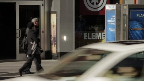 Man walking down the street Stock Footage 128983272