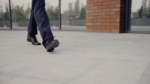 Man walking down the street Stock Footage 129552290