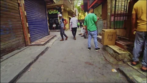 A man walking down a street while looking at his cell Stock Footage 292224041
