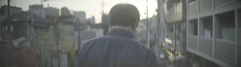 Man walking down Yuyake Dandan staircase, Tokyo. Sunset. 4k Log Anamorphic Stock Footage 248525703