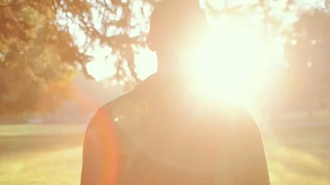 Man Walking During Bright Morning Sunrise (Steadicam) Stock Footage 81492003