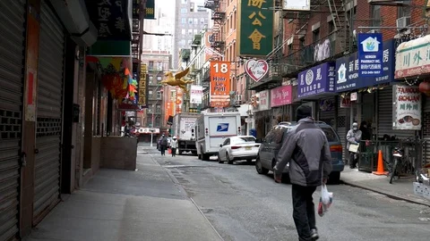 Man Walking In Empty Closed Chinatown During NYC Coronavirus Lockdown Stock Footage 128936183
