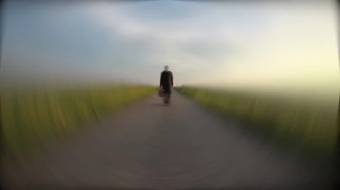 Man walking on empty  road in dream Stock Footage 40002556