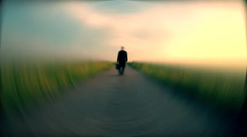 Man walking on empty  road in dream Stock Footage 40005214