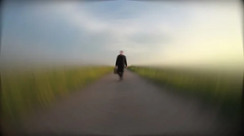 Man walking on empty  road in dream Stock Footage