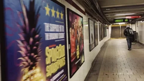 Man walking at the exit of a subway during the winter Stock Footage 136203194