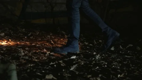 Man walking with a flashlight Stock-Footage 129905545