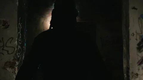Man walking with a flashlight3 Stock Footage 129905844