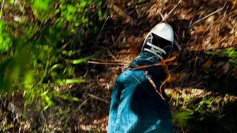 A man is walking in the forest 库存影片 108608793