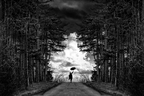 Man walking in forest road Stock Photos