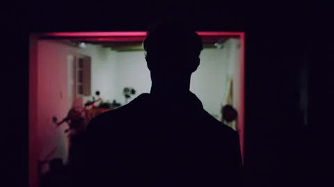 Man walking into a garage Stock Footage 279786360