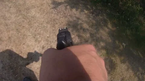 Man walking with gun (Slow Motion) 스톡 동영상 11298081