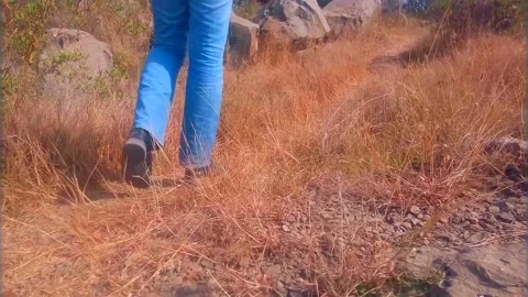 Man Walking Hike Path with Water Bottle Stock Footage 136988824