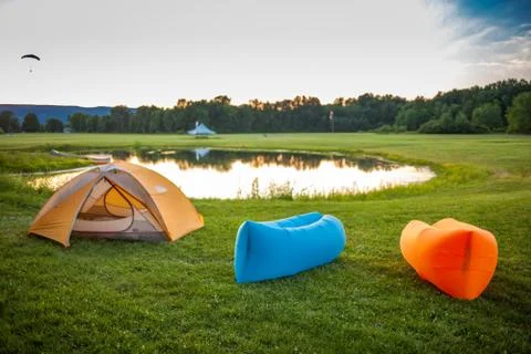 Man walking with Inflatable sofas Stock Photos
