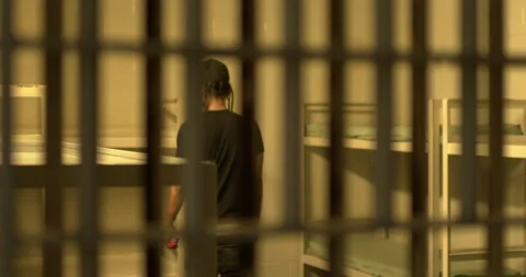 Man Walking in Jail Cell, Dark Vibes, Prison, Incarcerated, Jail, Crime Video stock 278115634
